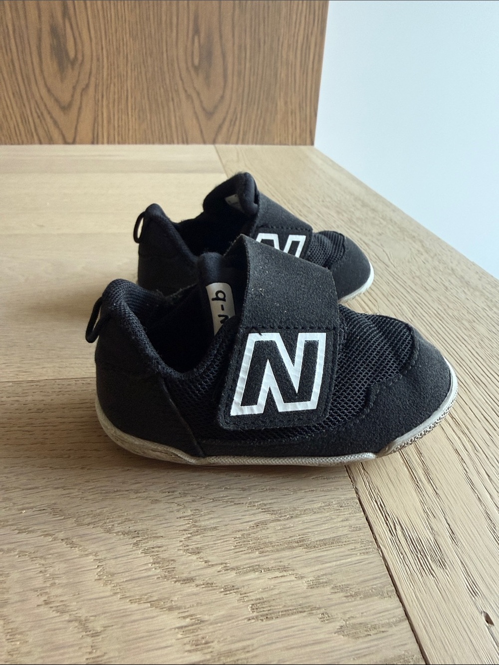 New Balance Black Velcro Baby Sneakers with White Logo
